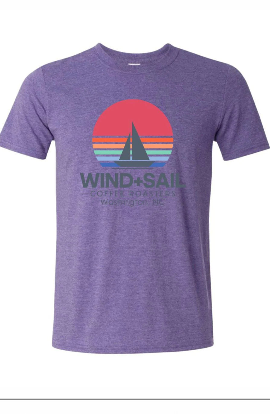 Purple t-shirt with sailboat graphic and 'Wind + Sail' text on a white background